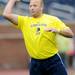 Andy Mignery looks to throw the ball during the Victors Classic alumni football game at Michigan Stadium on Saturday. Melanie Maxwell I AnnArbor.com